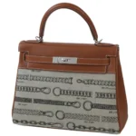 Hermès 2018 Rare Collectible Kelly 28 Dechainee Fauve Barenia & Canvas Palladium Hardware