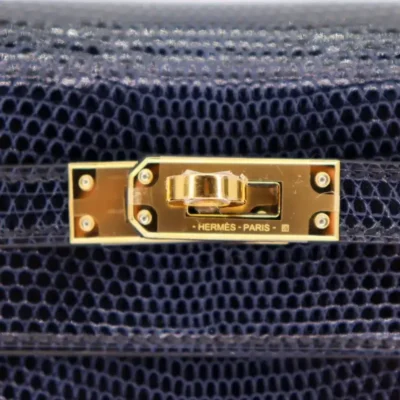 Hermès Kelly 25 Sellier Bleu Indigo Shiny Niloticus Lizard Gold Hardware