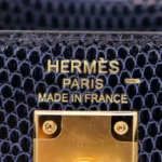 Hermès Kelly 25 Sellier Bleu Indigo Shiny Niloticus Lizard Gold Hardware