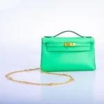 Hermès Kelly Pochette Vert Comics Swift Gold Hardware Lushentic Grade Bags